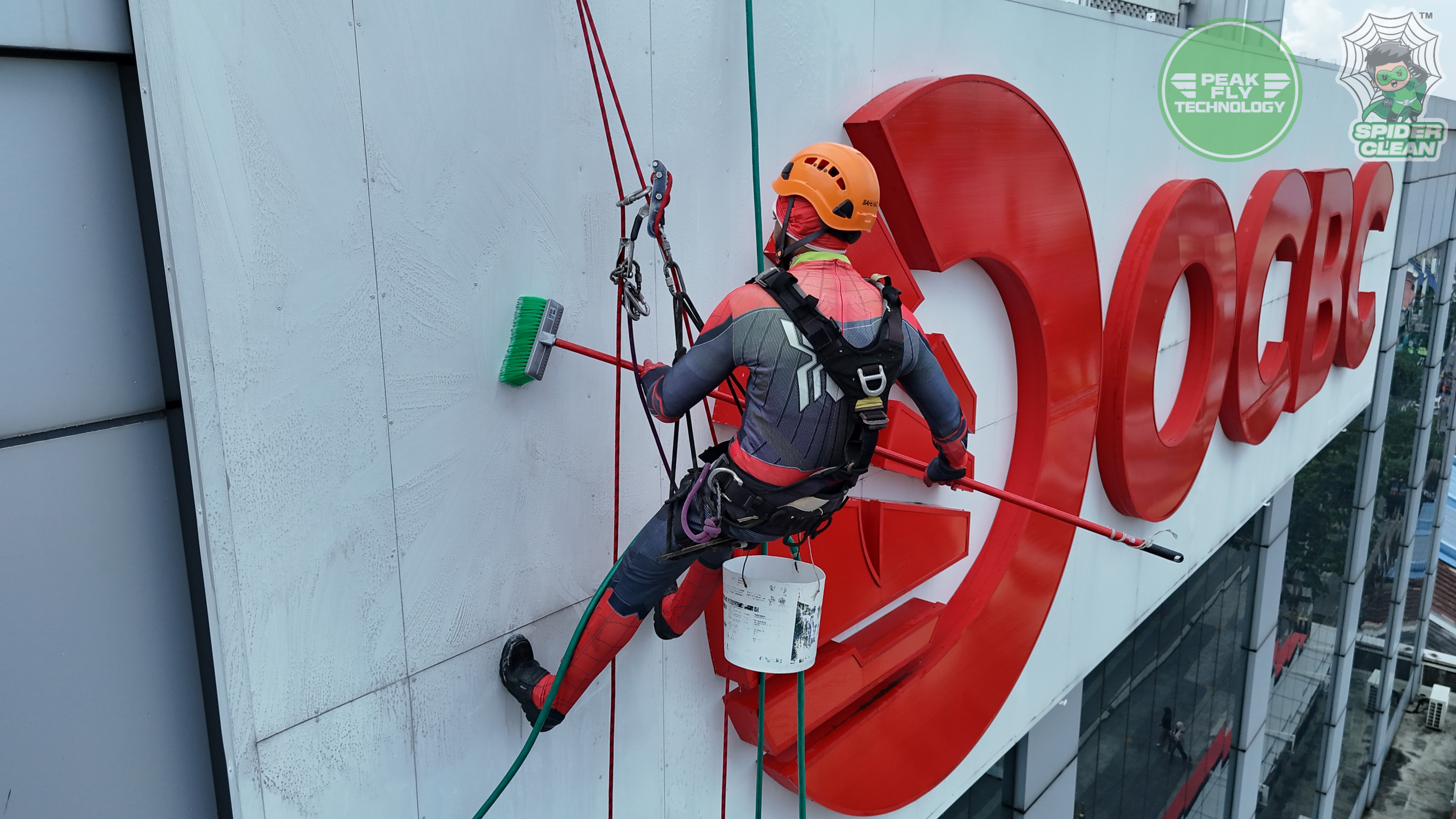Peak Fly Technology (M) Sdn. Bhd. | Project - OCBC SIGNBOARD CLEANING (ROPE ACCESS)